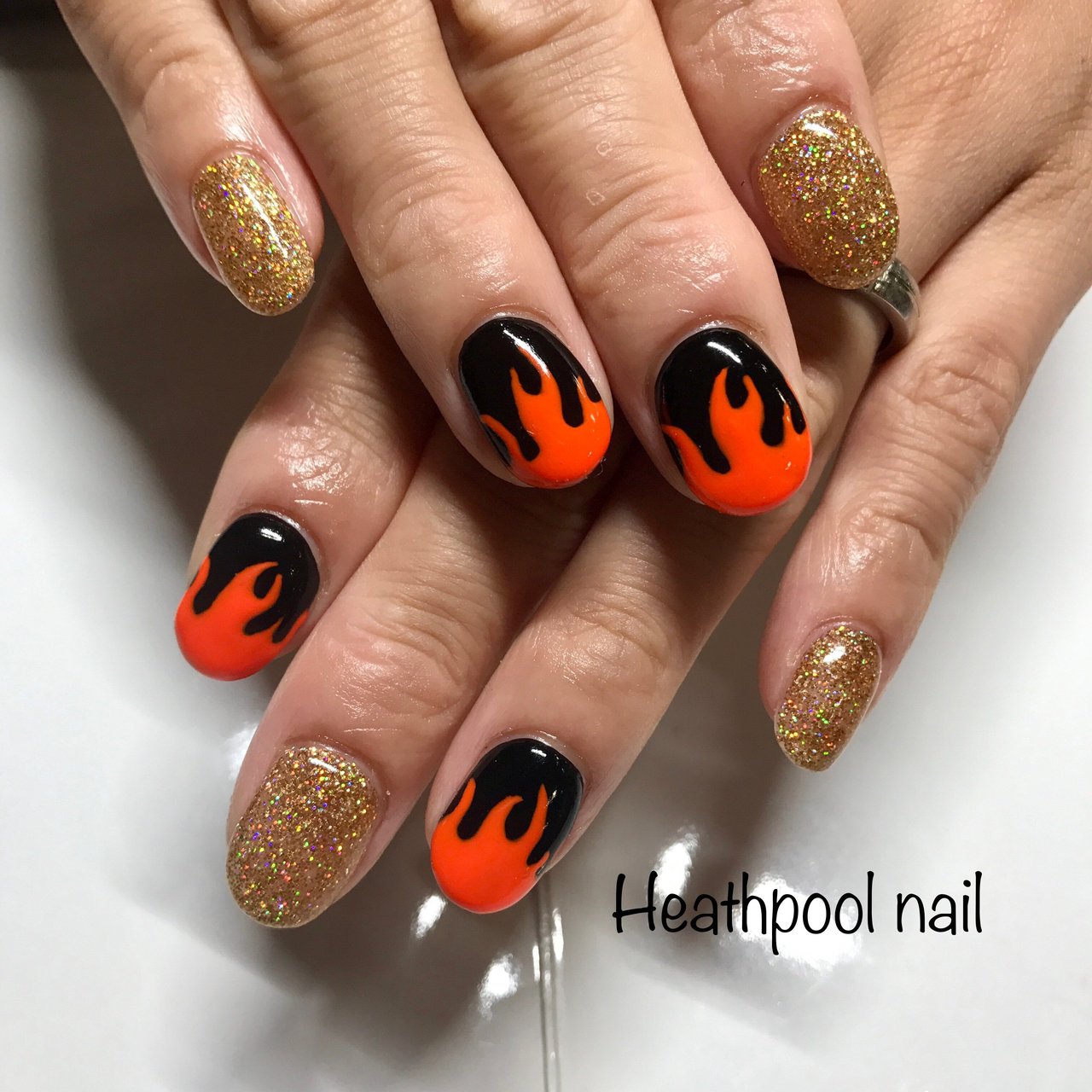 ハンド ラメ オレンジ ブラック ゴールド Heathpoolnailのネイルデザイン No ネイルブック