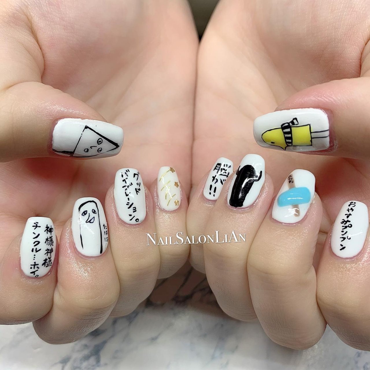 ハンド 痛ネイル キャラクター ミディアム ホワイト Nailsalon Lianのネイルデザイン No ネイルブック