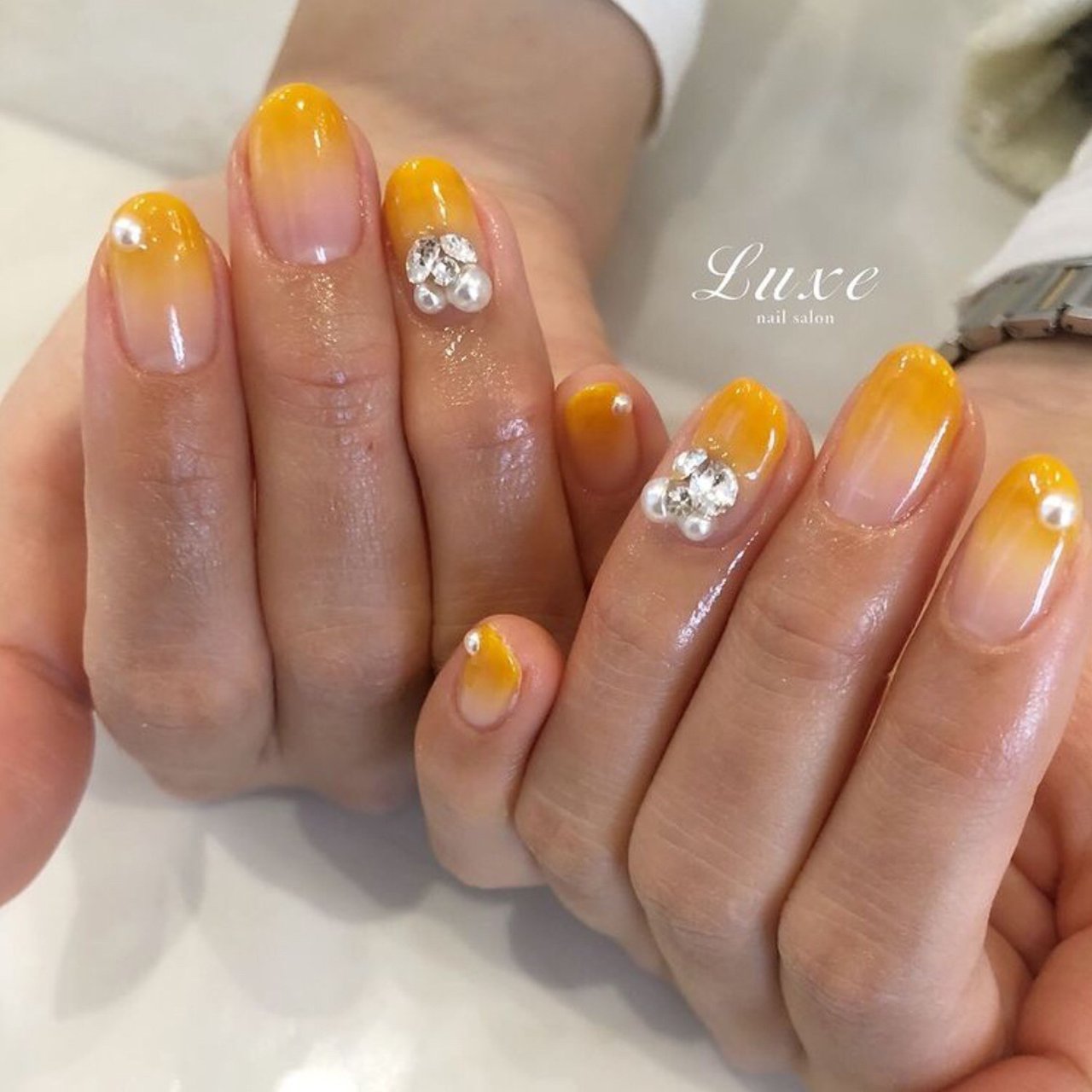 オールシーズン グラデーション ビジュー オレンジ イエロー Nailsalonluxe Ginzaのネイルデザイン No ネイル ブック