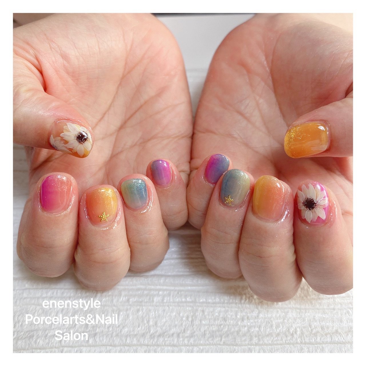 グラデーション フラワー レッド オレンジ イエロー Enenstyle Porcelarts Nail Salonのネイル デザイン No ネイルブック