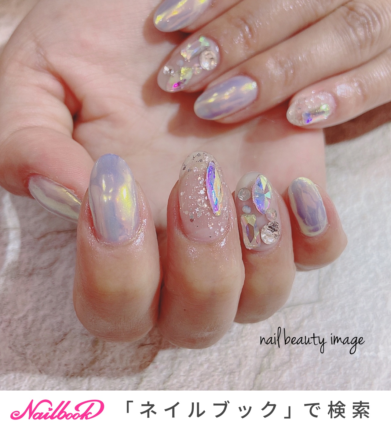 No121.オーロラクリスタル☆クロス☆ネイル 春/夏/ハンド/ホログラム/オーロラ - kajinailのネイルデザイン