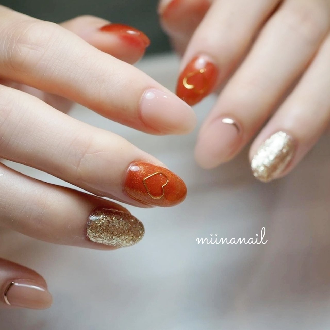 秋 ハンド ハート オレンジ ゴールド Miinanailのネイルデザイン No ネイルブック