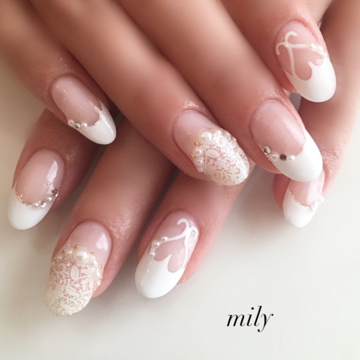 オールシーズン ブライダル ハンド フレンチ ハート Mily Nailのネイルデザイン No 2586545 ネイルブック