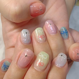 #リボンネイル #パーマネントジュエリー
#パステルネイル
#お持込デザイン
#可愛いネイル 
#アートし放題 #春 #入学式 #デート #女子会 #ハンド #シンプル #リボン #大人 #キラキラ #シアー #ピンク #イエロー #水色 #ジェルネイル #REVE #ネイルブック