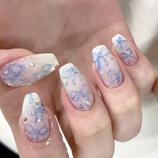 #手が綺麗に見えるネイル #肌トーンアップカラーネイル #肌馴染み良いネイルカラー #スキンカラー#オフィス#ナチュラル#ワンカラー#ワンホン#個性派ネイル#海外ネイル#夏ネイル#リボン#ホワイトネイル#ハンド#白ネイル #夏 #成人式 #バレンタイン #海 #ハンド #リボン #ミディアム #スクエア #ホワイト #水色 #ジェルネイル #お客様 #Lily_OPELIA NAIL #ネイルブック