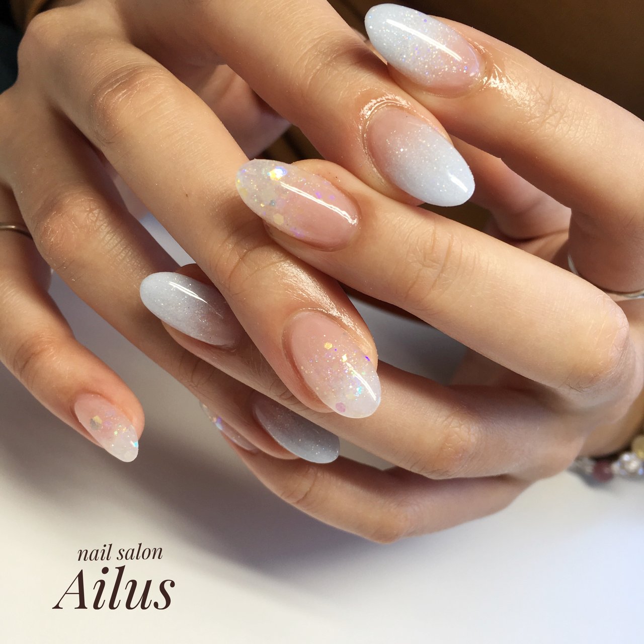 冬 ハンド ホワイト 水色 Nail Salon Ailusのネイルデザイン No ネイルブック