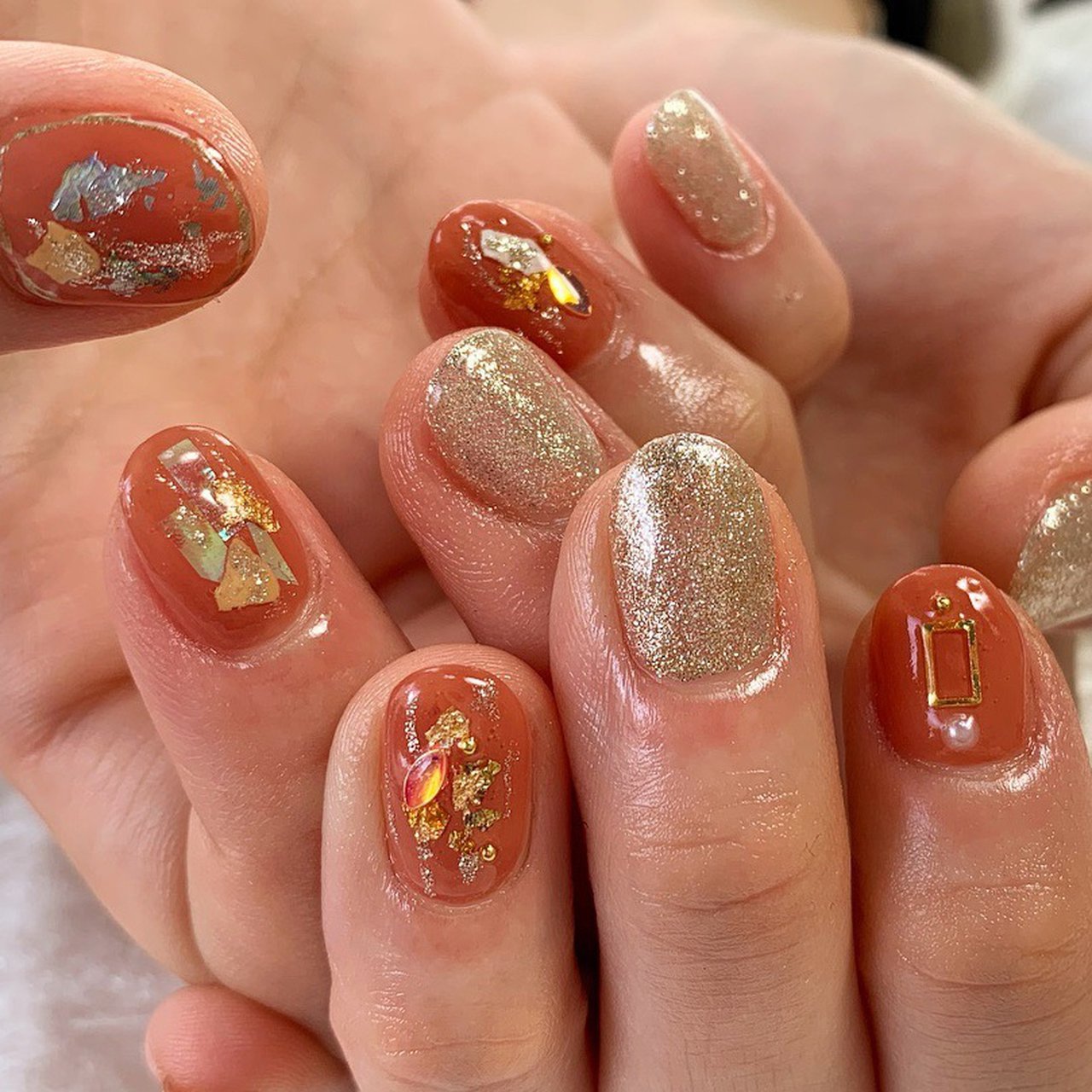 冬 ハンド オレンジ ゴールド ジェルネイル Nail Atelier Oukaのネイルデザイン No ネイルブック