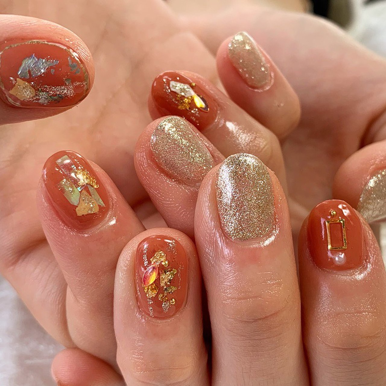 冬 ハンド オレンジ ゴールド ジェルネイル Nail Atelier Oukaのネイルデザイン No ネイルブック